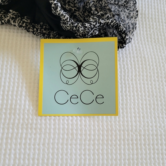 CeCe Cascading Puffy Sleeves Top - Picture 7 of 13